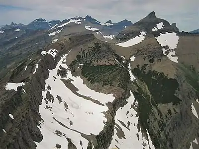 Iceberg Peak's south aspect in upper right, seen from Swiftcurrent Mountain.