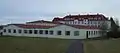 Kleppur, offices, and reception in the foreground, main building in the background.