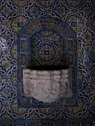 A holy water font inside the church.