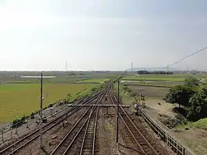 South of the station, the four tracks merge into one heading to Tokushima.