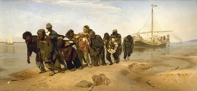 Image 16Barge Haulers on the VolgaPainting: Ilya RepinBarge Haulers on the Volga is an oil painting on canvas completed between 1870 and 1873 by the realist artist Ilya Repin. It depicts eleven men physically dragging a barge on the banks of the Volga River. Depicting these men as at the point of collapse, the work has been read as a condemnation of profit from inhumane labor. Barge Haulers on the Volga drew international praise for its realistic portrayal of the hardships of working men, and launched Repin's career. It has been described as "perhaps the most famous painting of the Peredvizhniki movement [for]....its unflinching portrayal of backbreaking labor". Today, the painting hangs in the Russian Museum in Saint Petersburg.More selected pictures