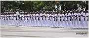 Probationary midshipmen executing the manual of arms in an initiation ceremony.