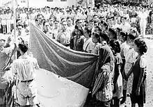 Raising the Indonesian flag in front of the witnesses