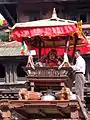 Statue of Indra with his hands bound at Maru