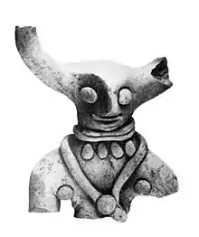 Indus pottery figure of horned deity.