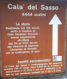 Sign about Calà del Sasso at the trailhead: 4444 steps, built in the XIV century, length 2.546,44 m, it takes 2 hours to climb to the top, elevation 744 m