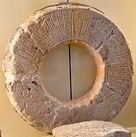 Inscribed stone ring of a fountain, in the name of king Shu-Sin. Pergamon Museum.