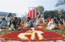 International Mother Language Day Celebration in Dhaka, with the Martyr's Monument in the background