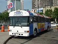 A shuttle bus pulling into the terminal