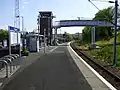 View past the footbridge towards the former IBM Halt.