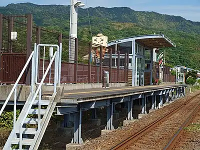 A statue of Torao-kun is located at the station entrance.