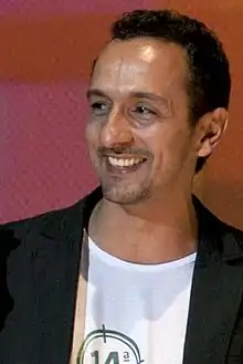 Irandhir Santos as João.