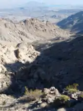 A color picture of some desert mountains