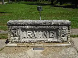 Irving stone marker, located where the post office once stood.