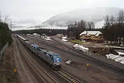 The Empire Builder passing the Izaak Walton Inn