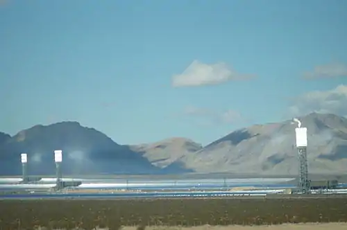 Image 60Ivanpah Solar Electric Generating System with all three towers under load during February 2014, with the Clark Mountain Range seen in the distance (from Solar power)