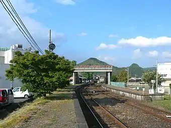 A view of the overhead bridge which gives access to the platform opposite the waiting room.