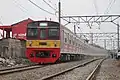 A KRL Jabodetabek 203 series 8-car set on the Bogor Line in July 2012