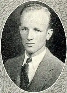 a black-and-white picture of a 21-year-old man wearing a white shirt, tie and sport coat, from his college yearbook