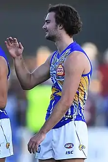 Male athlete in an Australian rules football game