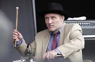 Jah Wobble playing drums.jpg