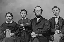 From left to right: Ellen G. White ― William C. White ― James S. White ― James E. White