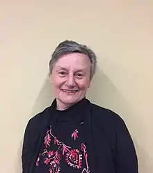 Colour photograph of scientist Jane Dyson, a white woman with short light-brown hair.