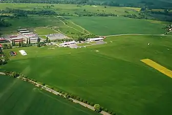 Aerial photo of Jaroměř airport, the park is the uppermost green strip seen above it.