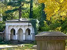 Jay Cooke's Mausoleum, behind the church.