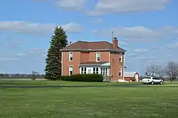 House and farm fields south of West Jefferson