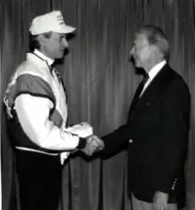 Jerry Dunn shakes President Jimmy Carter's hand.