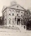 NW corner of 6th & Brady St: George Cram Cook boyhood home (razed).