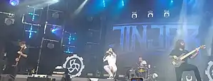 Jinjer performing in 2019 (L–R: Ibramkhalilov, Shmayluk, Ulasevich, Abdukhanov)