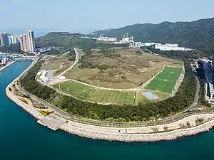 Soccer pitches near to a sea wall