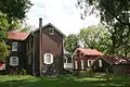 Farmhouse backyard, summer kitchen and smoke house