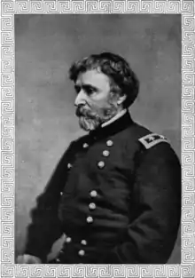 A head and torso photograph of a United States general during the American Civil War.  He is looking to the right, almost in profile.  He has fairly short, dark hair and a short beard that is mostly grey.