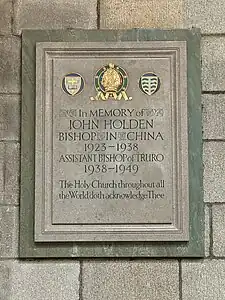 Holden's memorial in Truro Cathedral, featuring the seal of the seal of the Anglican Diocese of Western China on the top right