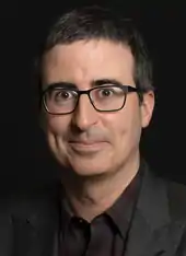 Portrait photograph of John Oliver