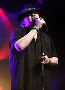 Popper performing in 2012