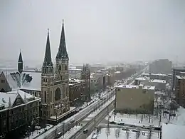 Looking west along W Wisconsin, with Gesu Church visible