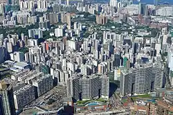 Aerial view of Jordan, with Austin Station in the lower part of the picture. The colorful building is Kwun Chung Municipal Services Building.