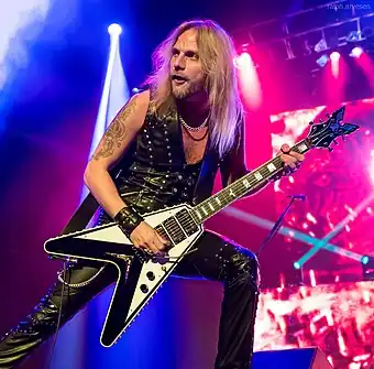 Faulkner performing with Judas Priest in 2015