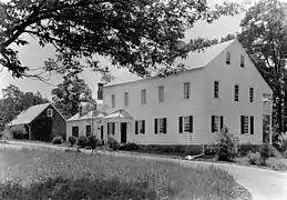 Back of Rockingham c. 1910 with stone outer house still in place before the move