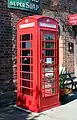 Preserved K6 phone box, with original telephone equipment with A/B push buttons