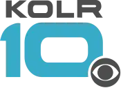 Gray wide letters KOLR above a teal, somewhat futuristic 10 with squarish sides. The CBS eye in gray overlaps the 0 in the lower right with a white cutout.