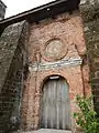 The side door on the western side of the church