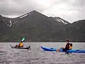 Kayakers off the coast of Raspberry Island.