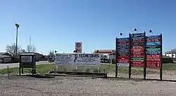 Signs along Market Street in Keenesburg.