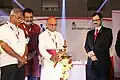 Bernard Moras, Archbishop of Bangalore inaugurating the inauguration ceremony of KE entrepreneur in the presence of T.V. Mohandas Pai, former Board member of Infosys, and J.L. Lobo, Member of the Legislature Assembly, Government of Karnataka