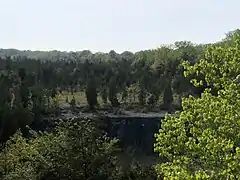 Former quarries cause dramatic cliffs like these.